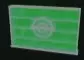 Green wall panel with a circular emblem.