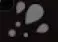 White scattered droplet icon for Napalm.